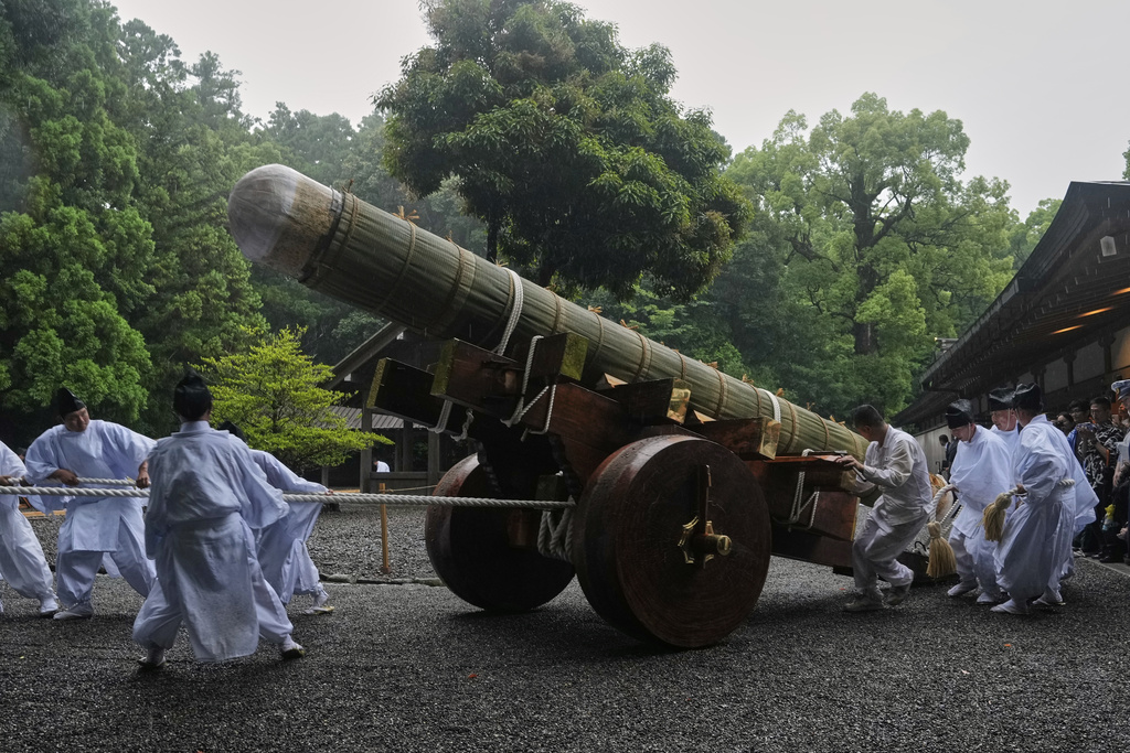 Priests and officials in the Shinto priesthood march during Yamaguchisai, a kickoff ceremony of the Shikinen Sengu ritual, which concludes in 2033 (AP) 